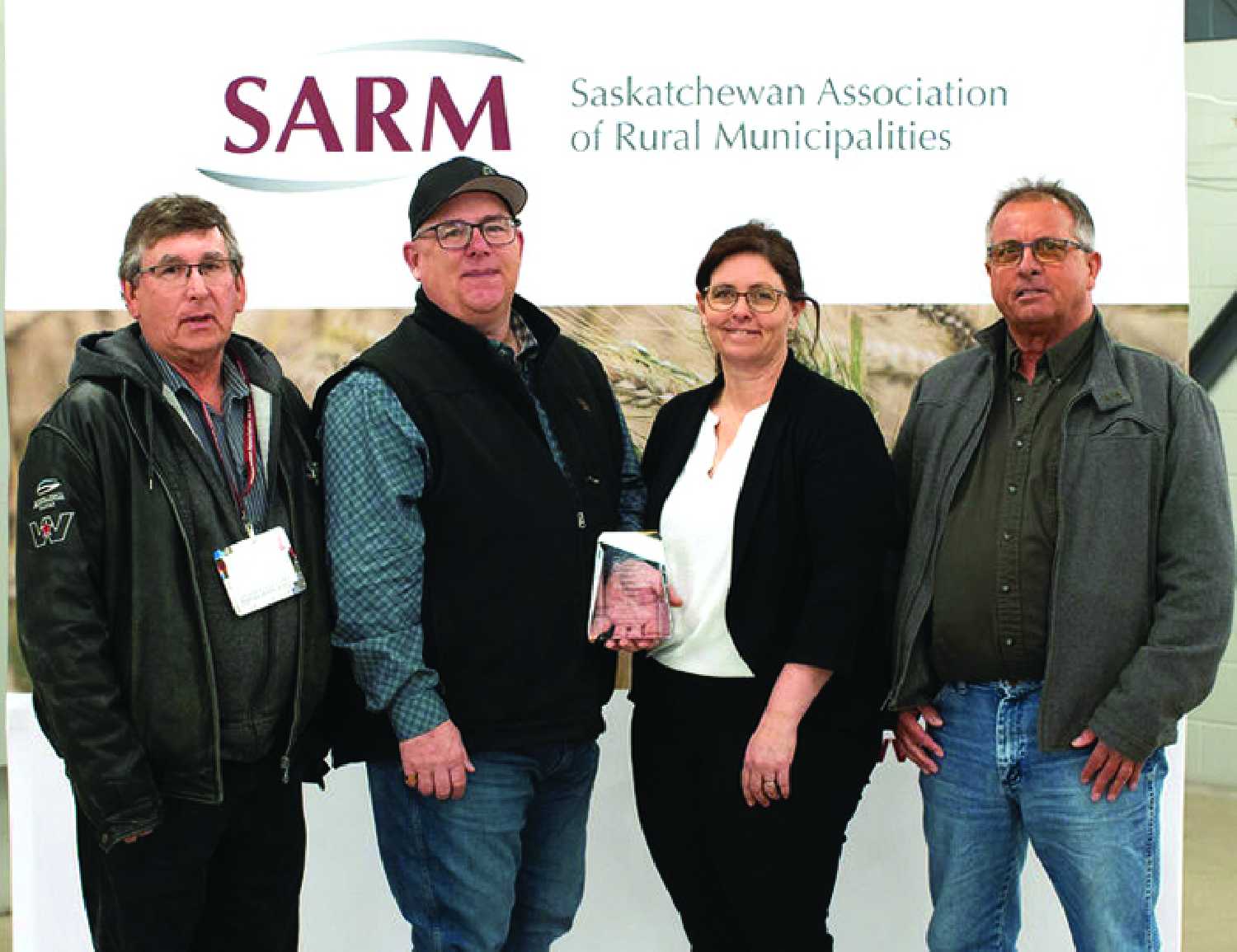 The RM of Moosomin with their Sask Municipal Award. From left are Division 6 Councillor Ernest Dobson, Reeve Dave Moffatt, Administrator Kendra Lawrence, and Division 1 Councillor Councillor Rob Hanson.